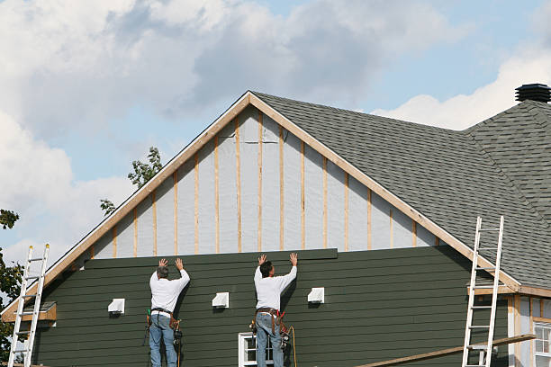 Professional Siding technician working in Mills River, NC